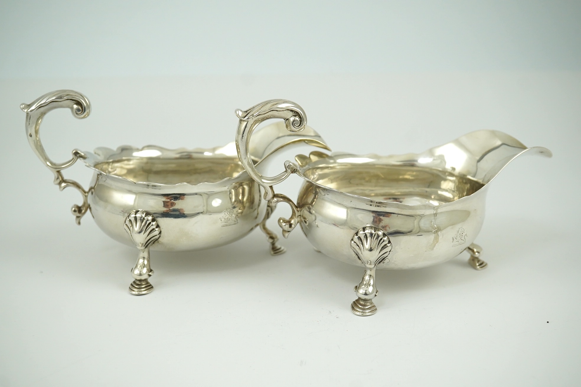 A pair of George II silver sauceboats, by Henry Brind